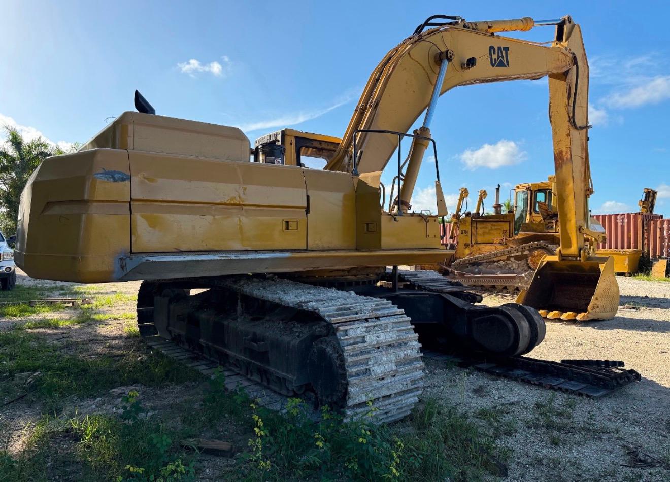CAT excavator staged for heavy equipment transport in Miami