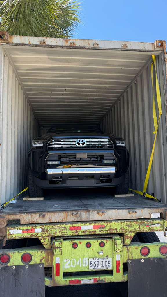 Toyota pickup secured inside a shipping container for overseas export
